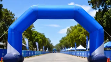 Inflatable Arch Displays, inflatable event arch, promotional inflatable arch, custom inflatable arch, outdoor event display, race event arch, branded event signage, inflatable entrance arch, trade show display, sports event branding, advertising arch, portable event display.